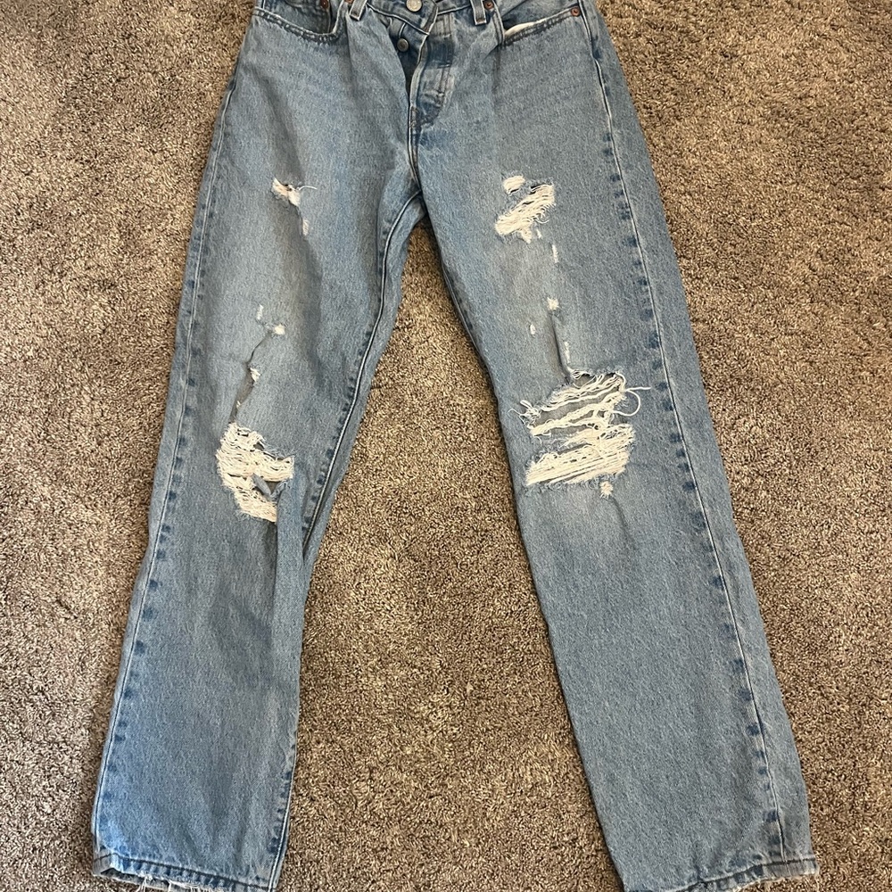 Distressed Blue Denim Jeans